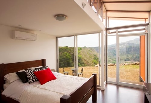 12-Master-Bedroom-Recycled-Container-House-Architect-Benjamin-Garcia-San-Jose-Costa-Rica-Solar-Panels-Recycled-Metal-www-designstack-co