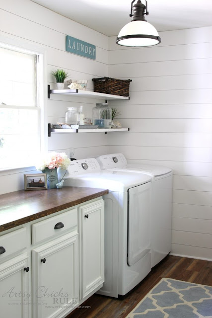 Bright laundry with shiplap and shelves
