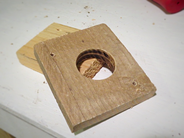 holes cut in pallet wood scrap