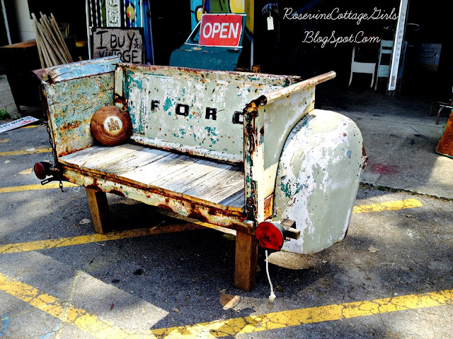 Photo of an  antique Ford truck bed that has been made into a bench along the 400 Mile Long Yard Sale, Southern Yard Sales, Super Yard Sales, Antique Yard Sales by Rosevine Cottage Girls