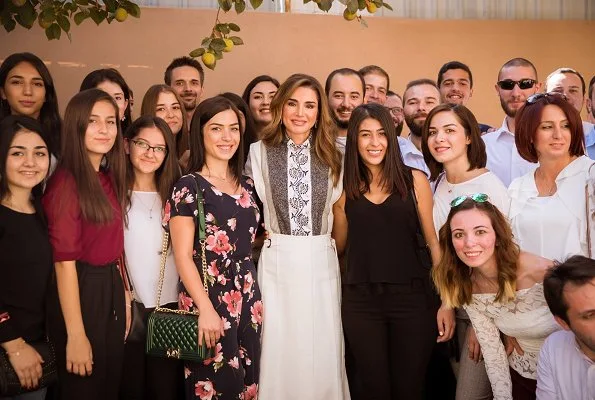 Queen Rania wore Chloe hoop trim contrast panel blouse, Proenza Schouler crepe midi skirt and Dior D-Choc pumps