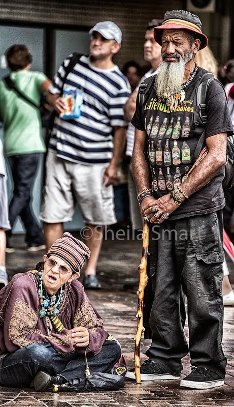 Couple watching busker