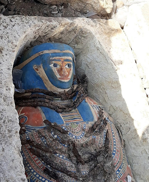 Eight limestone sarcophagi with mummies found near Giza's Great Pyramids
