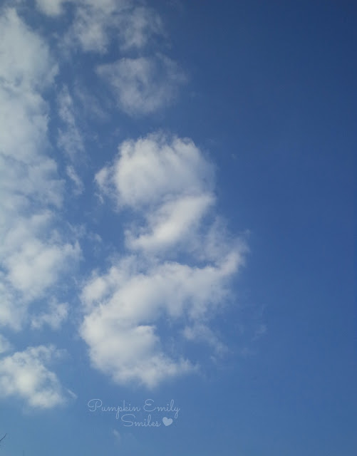 Clouds that look like a mother and her baby or a mermaid