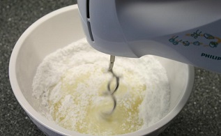 SHC TUTORIALS Combine egg whites and lemon juice in a large bowl