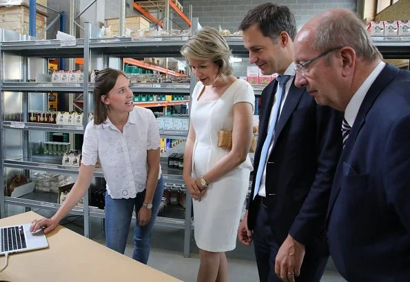 Queen Mathilde wore Zara Spring Summer 2012 White Cap Sleeve Peplum Dress, gold earrings, and carried Diane Von Furstenberg clutch