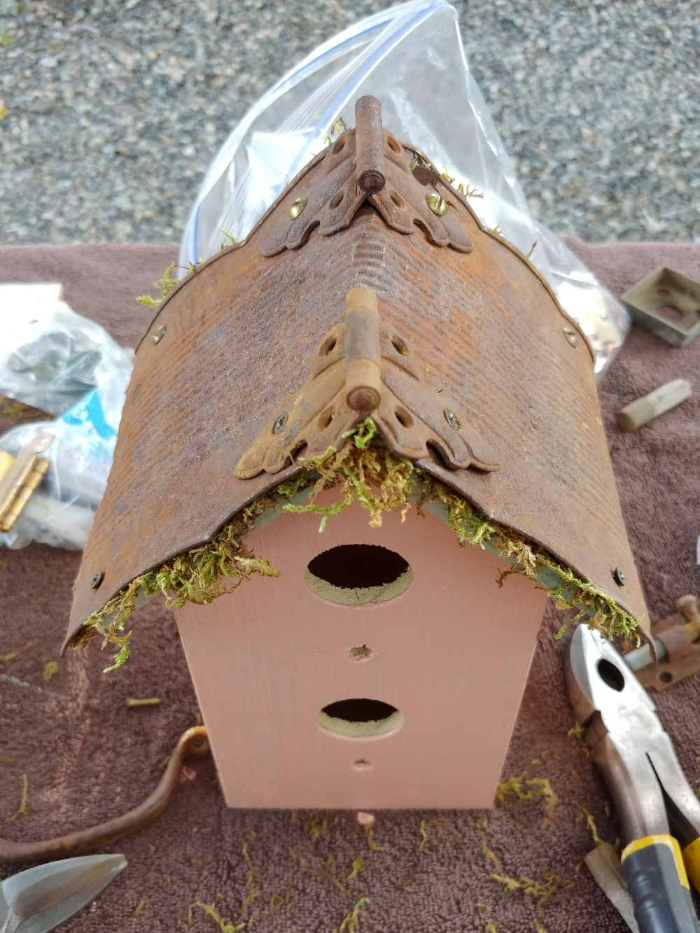rusty birdhouse roof