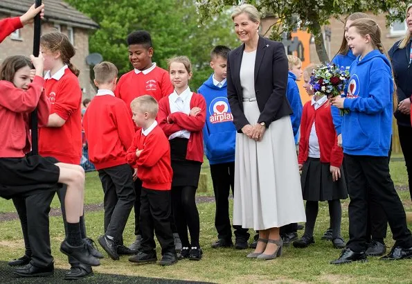 The Countess of Wessex wore Max Mara belted stretch-cady midi dress. Countess Sophie wore a white cady dress by MaxMara