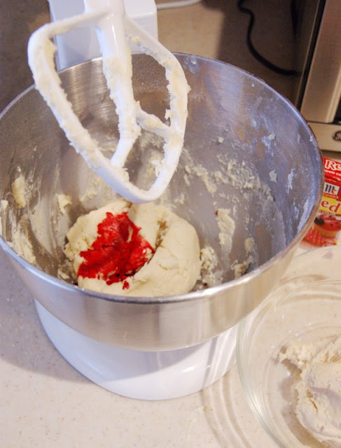 Making Candy Cane Cookies ~ two colors of almond sugar cookie dough twisted together! A fun & festive Christmas treat.  www.thekitchenismyplayground.com