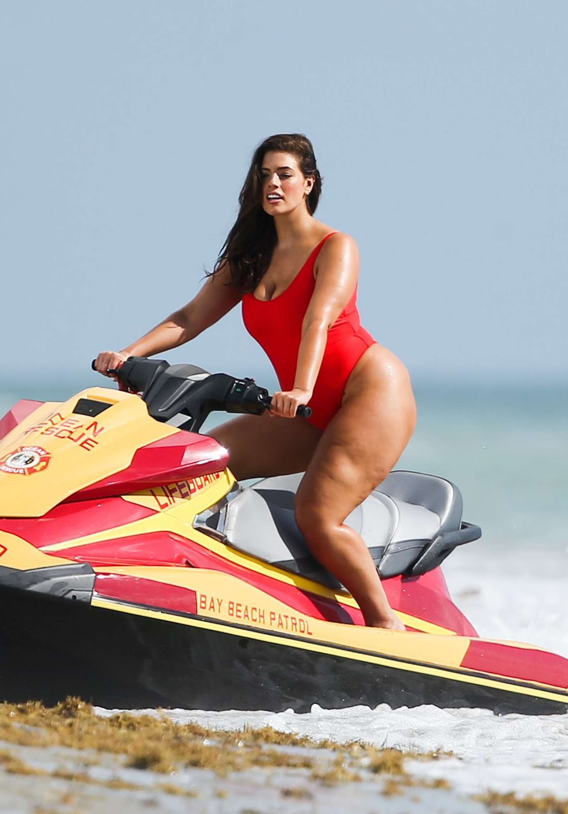 Ashley Graham in Red Swimsuit on a Jetski in Miami.