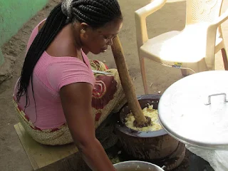 Pounding fufu in Ghana.