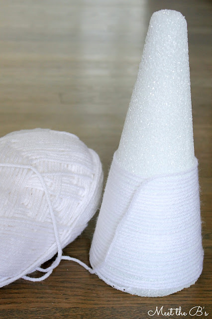 How to make easy DIY Valentine's Day decor made from yarn and styrofoam cones.