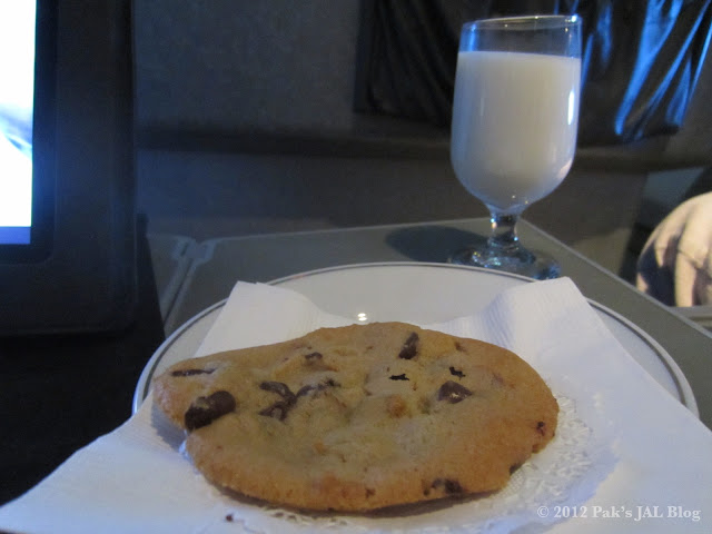 Freshly baked on board cookie and milk