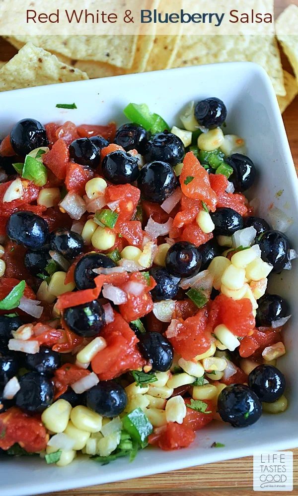 Red, White, and Blueberry Salsa | by Life Tastes Good is a unique blend of sweet & savory that is perfect with your favorite chips, but also delicious as a topping for fish, chicken, and even pork for an easy dinner any night of the week!