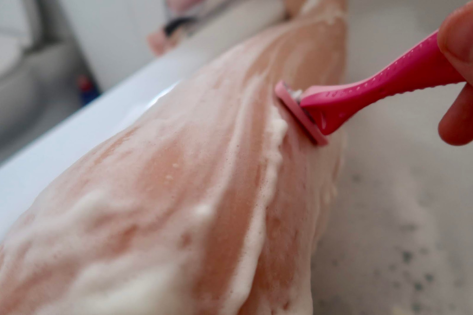 woman-shaving-legs