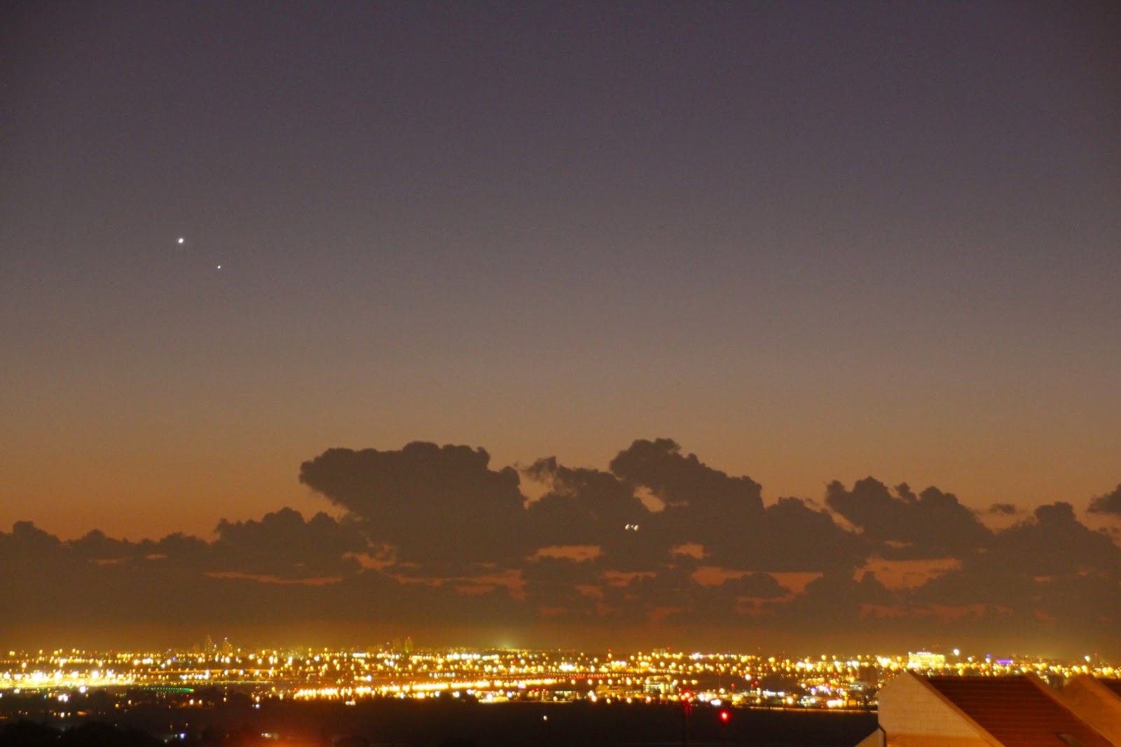 Venus, Mercury and an airplane taking off
