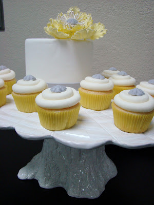 yellow cupcakes with vintage gray buttons