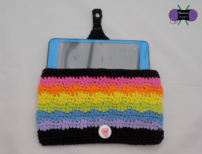 http://www.ravelry.com/patterns/library/rainbow-sherbert-tablet-cover