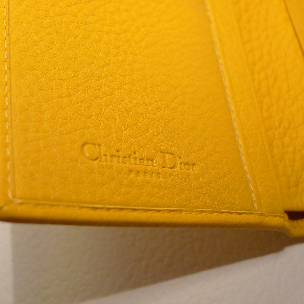 One Girl's Junk Is Another Girl's Treasure YELLOW DIOR WALLET SOLD