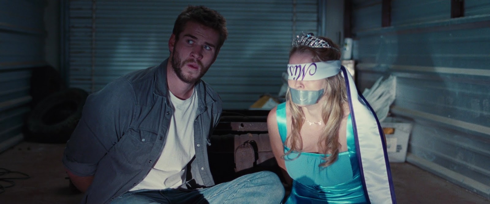 Keywords: hostage, tied up, duct tape, blindfolded. 