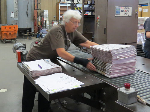 assembling newspapers