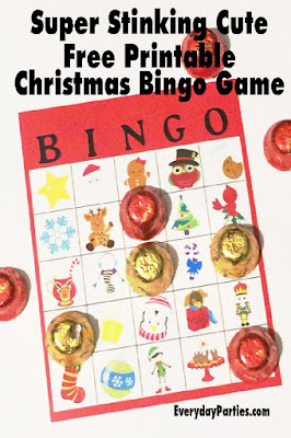 Enjoy a little whimsical fun at your Christmas party with this super cute Christmas bingo game.  This free printable game will have even the toughest party guest wanting to play and having a good time. #christmasparty #bingo #chirstmasbingo #christmasgame #diypartymomblog