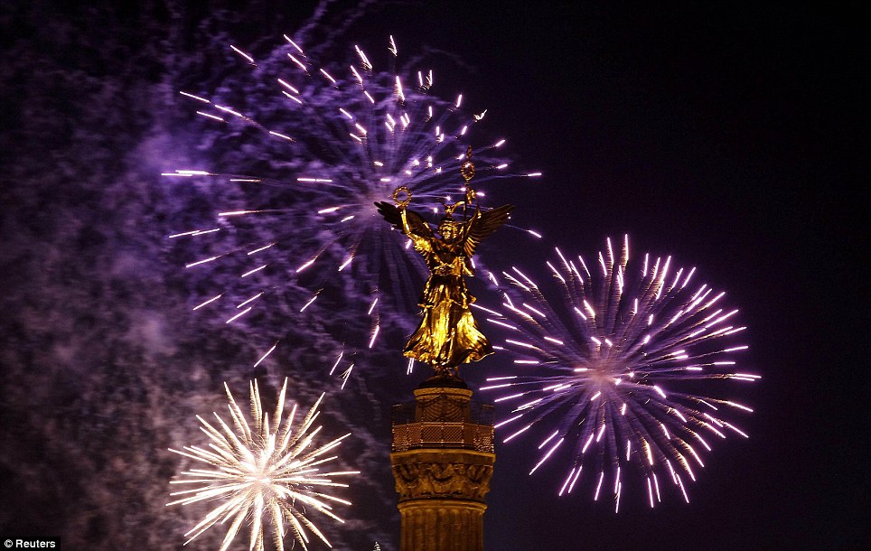 Here comes 2012! Big Ben lights up the sky with firework display to