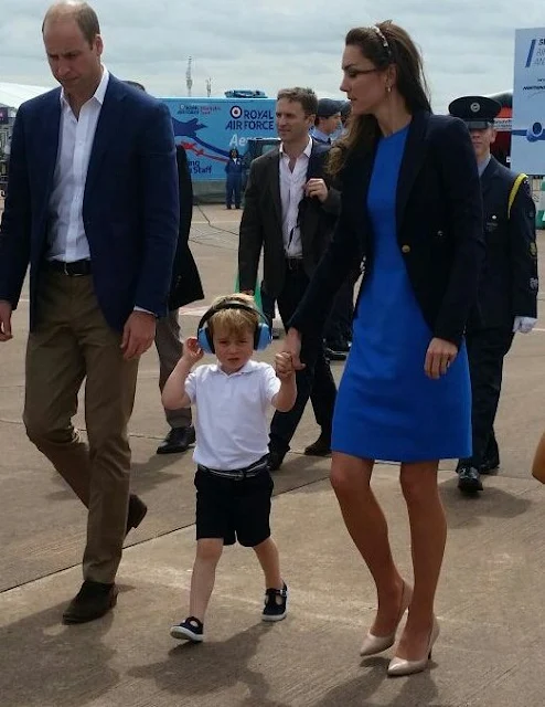 Prince William, Kate Middleton and Prince George visit the Royal International Air Tattoo at RAF Fairford. Kate wore Stella McCartney dress