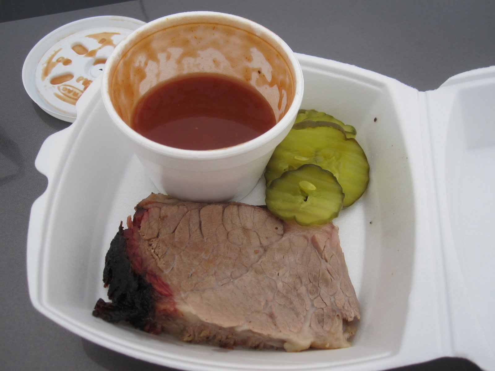 Man Up Tales of Texas BBQ™ Brisket at Cowpokes BarBQ (Pearsall, TX)