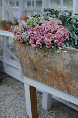 A charming vintage laundry sink for the greenhouse