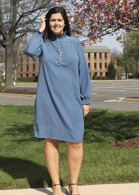 A blue crepe dress with high button-up nick and bishop sleeves using the Simplicity 8166 sewing pattern.