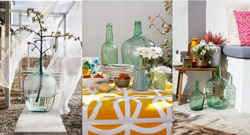 Garrafas de cristal como jarrones decorativos para el hogar