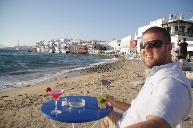 Male having cocktails at Little Venice Mykonos Male having cocktails at Little Venice Mykonos