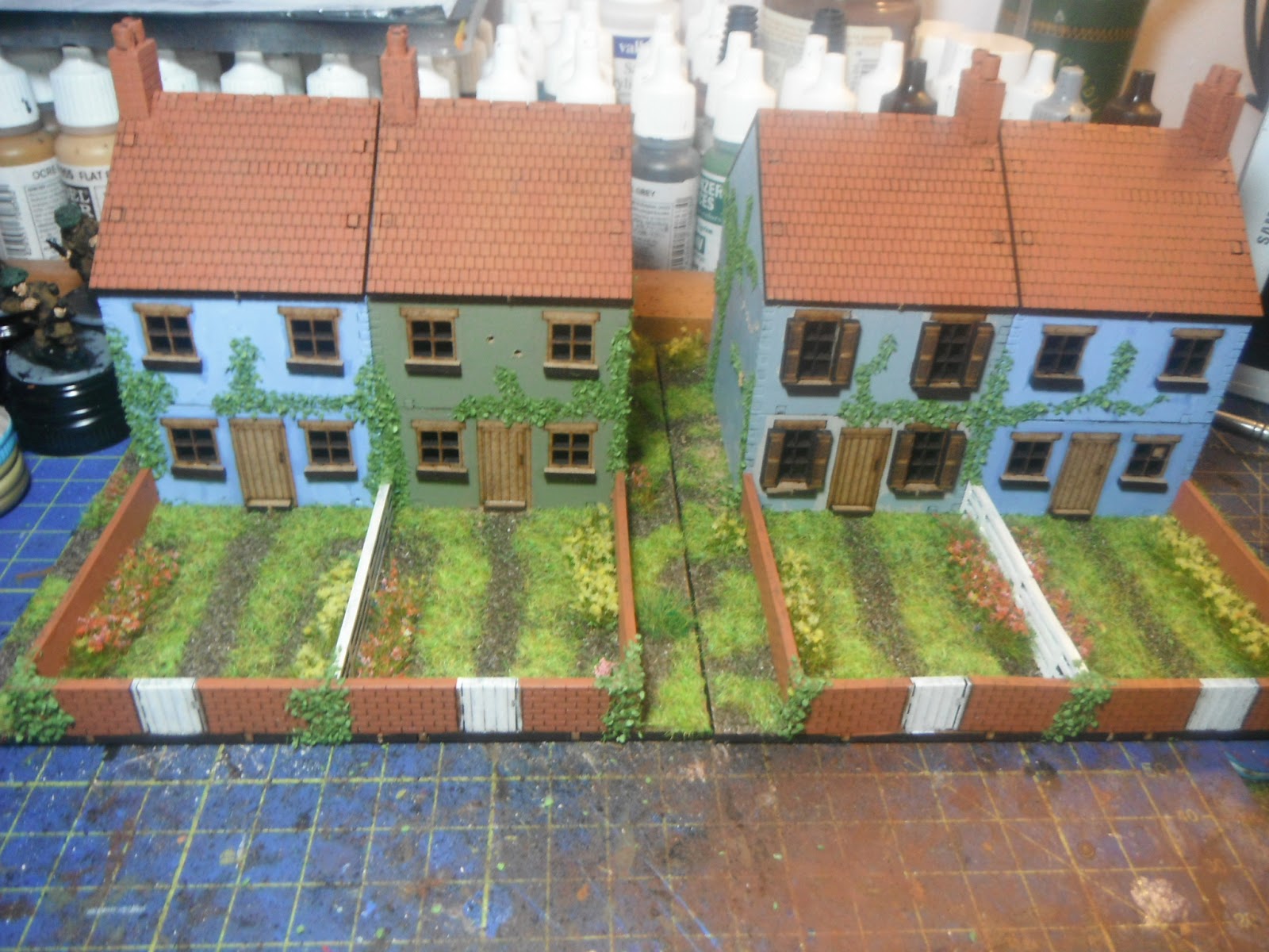 A figure painting therapy project. Giving simple MDF buildings a makeover!