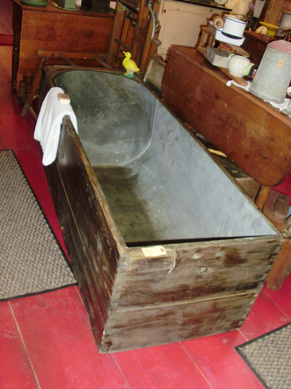 Log Cabin Antiques & Gifts Fabulous find! Primitive wooden bathtub