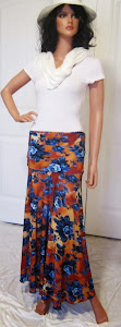 Ladies Abstract Blue Flowers on a Rust background, Stretch Jersey Knit Maxi