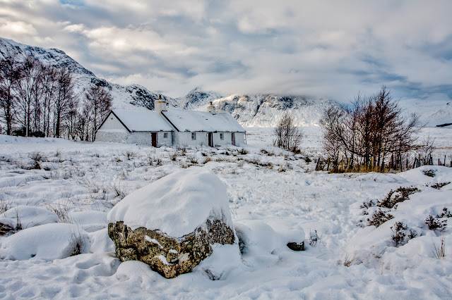 photo of Snow on Blackrock Cottage together with sun on  Buchaille Etive Mor 