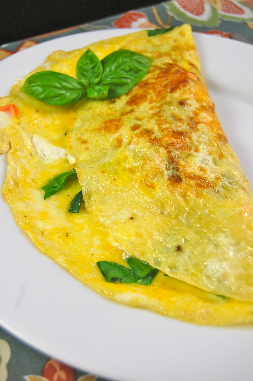 La Petite Maison Verte Salmon Omelette with Caramelized Onions, Spinach and Chevre