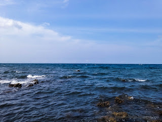 Stretch Of Sea Water Waves On Rocky Coral Reefs Of The Beach At Umeanyar Village, North Bali, Indonesia