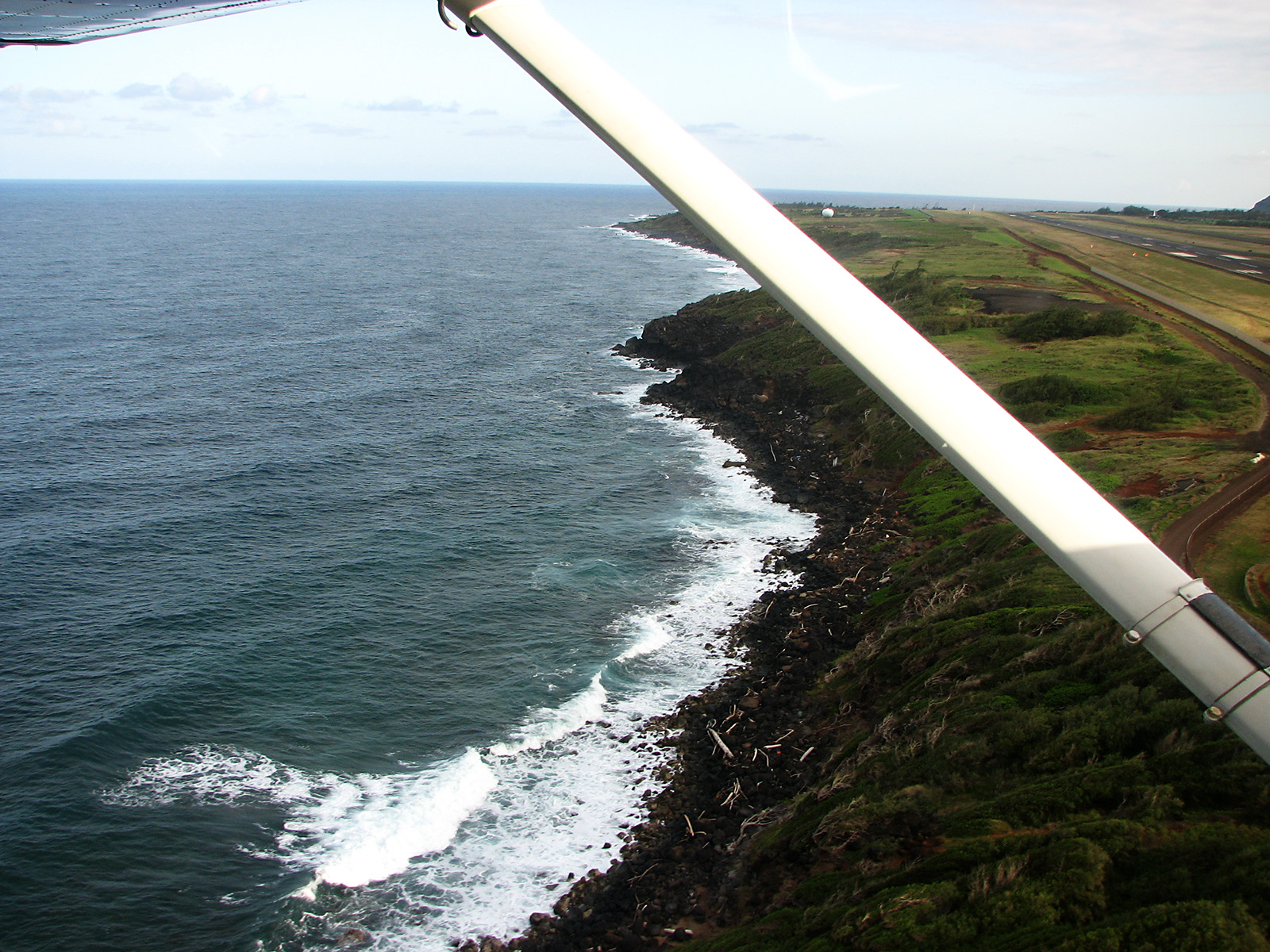 A mile of runway will take you anywhere. Crossing off Hawaii by flying