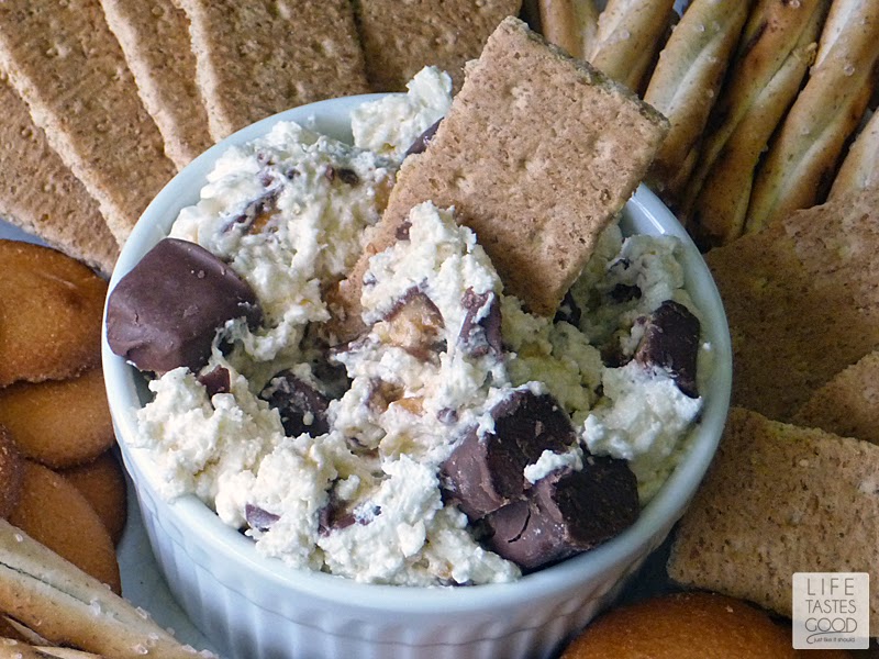 SNICKERS Dip | by Life Tastes Good is a sweet, creamy, dip perfect for the Big Game! This sweet cream cheese dip is loaded with SNICKERS Bites and a great dip for pretzels, apples, cookies, and graham crackers too! #BigGameTreats #ad