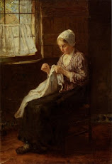 Mending by the window