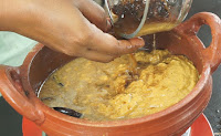Adding-tamarind-for-karuvattu-kulambu