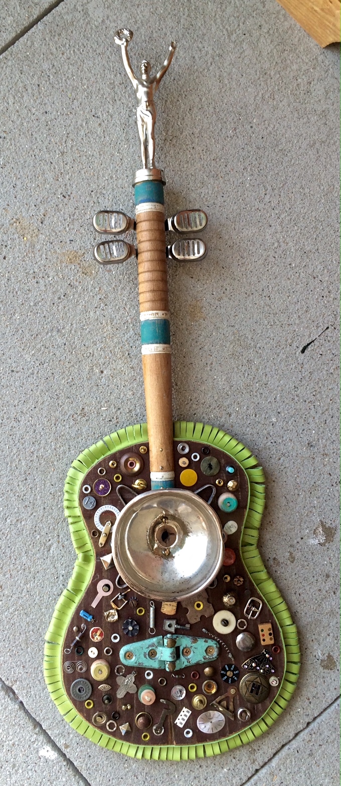 studio cb Grass Skirt Serenade / ukulele sculpture