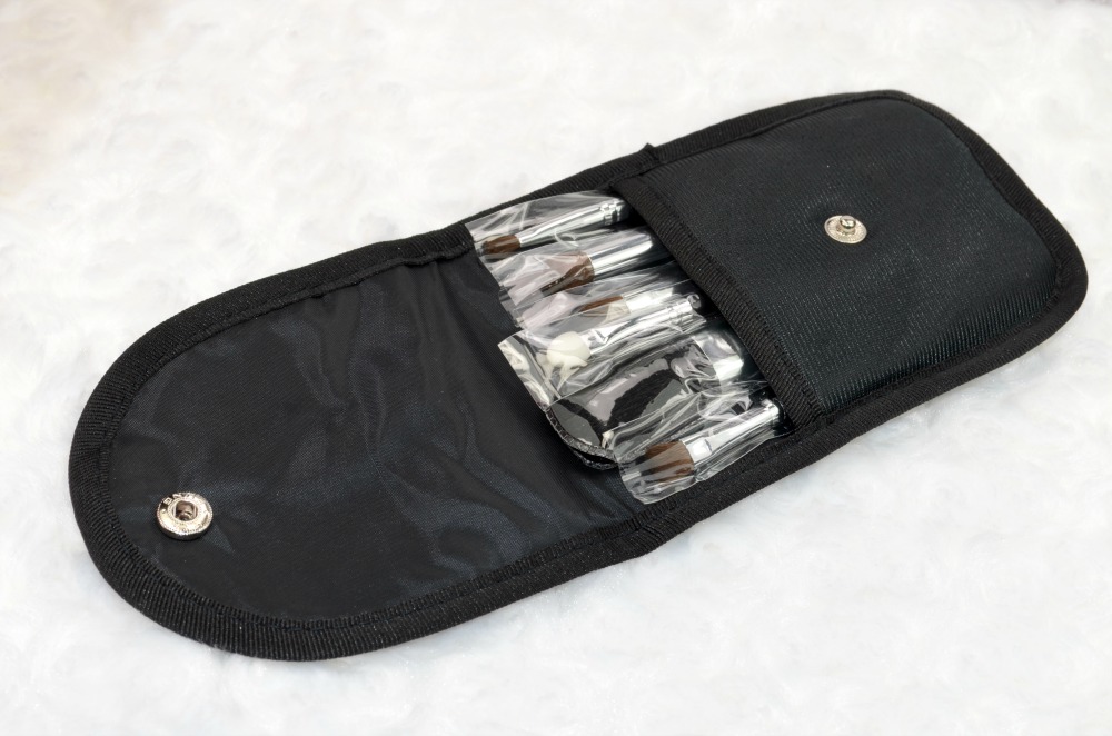 Close up image of the makeup brush pouch containing the brushes