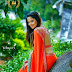 Anchor Anasuya Hot Hip Stills In Orange Sari