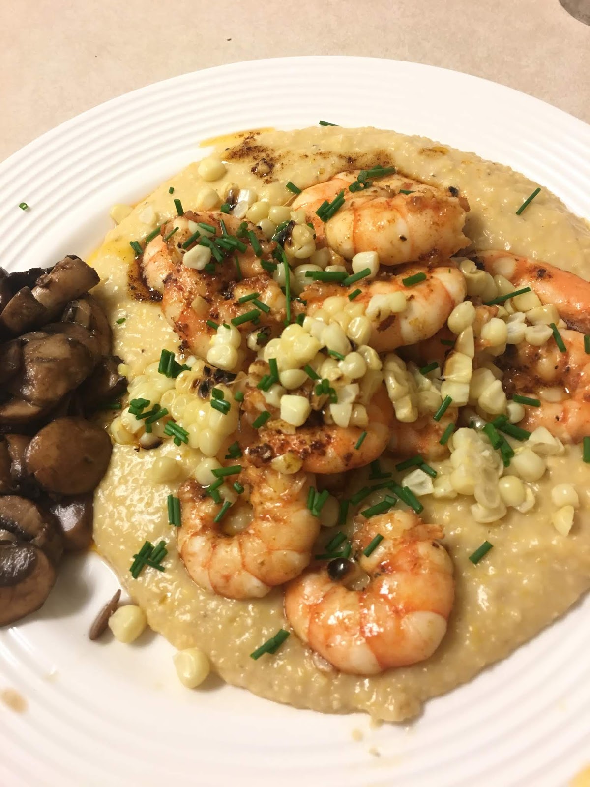 Pancakes and Paella Browned Butter Shrimp and Grits featuring Sumter