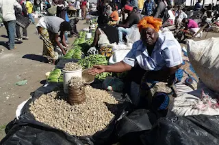 Selling vegetables in Zambia on market day