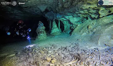 Underwater archaeologists studying the world's largest flooded cave system.