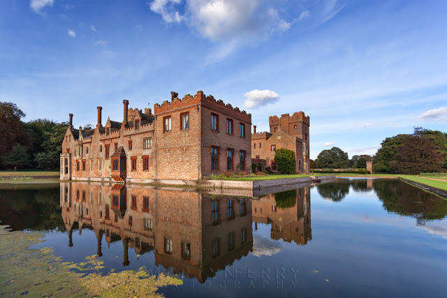 Reflection of Oxburgh Hall in Norfolk on a late summers evening